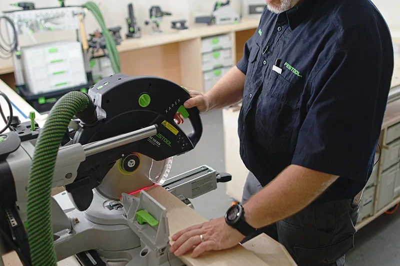 Brent using a miter saw