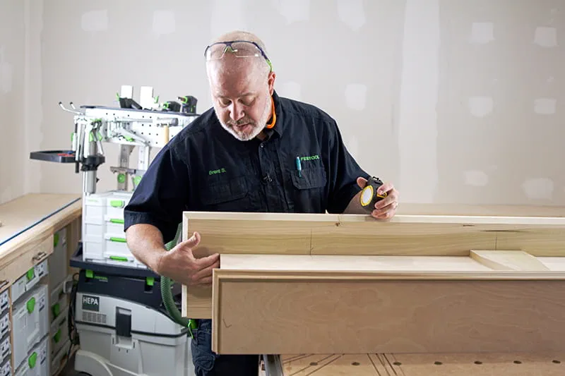 Brent connecting two upper pieces of the mantel