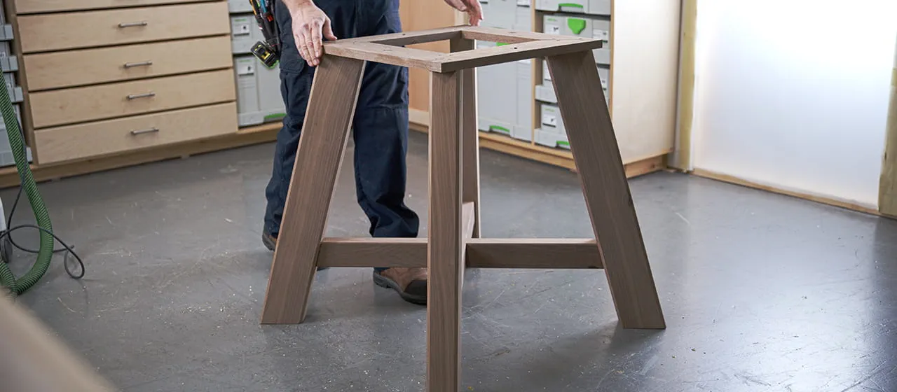 Putting table legs together and prepping top